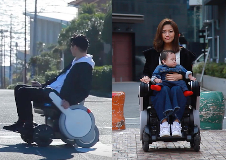 【写真】住宅街で電動車椅子に乗っている男性と、赤ちゃんを抱いて電動車椅子に座る女性。